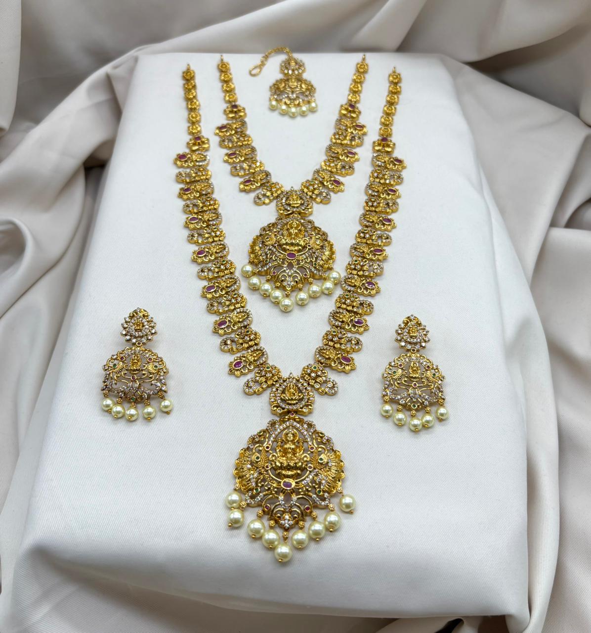 Alt Text:
Lakshmi Devi Long Haram with Power Billa and Clearing Combo Set, premium temple jewellery design.