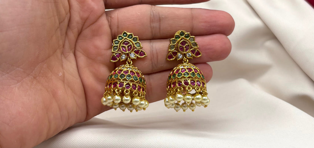 kempu jhumka green stones, accented with pearl hangings Earrings