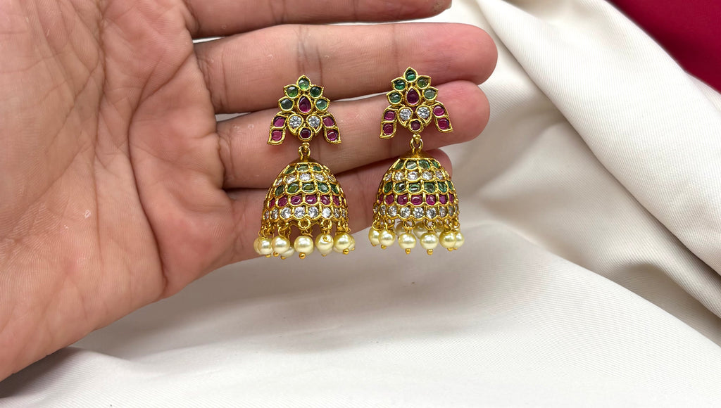 kempu jhumka white (American Diamond) stones, accented with delicate pearl drops Earrings
