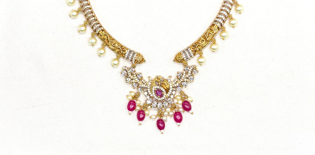Matte finishing American Diamonds with peacock design with Pink Beads Kanti