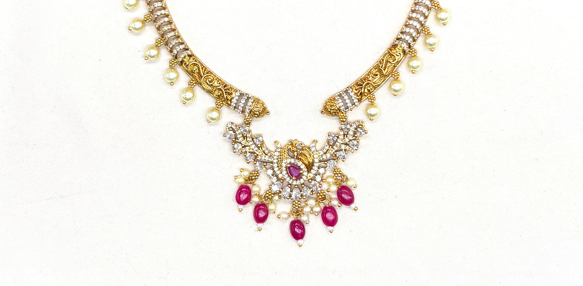 Matte finishing American Diamonds with peacock design with Pink Beads Kanti
