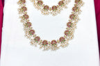 Beautifully designed with Lotus flowers and Guttapusalu clustered pearls Combo set