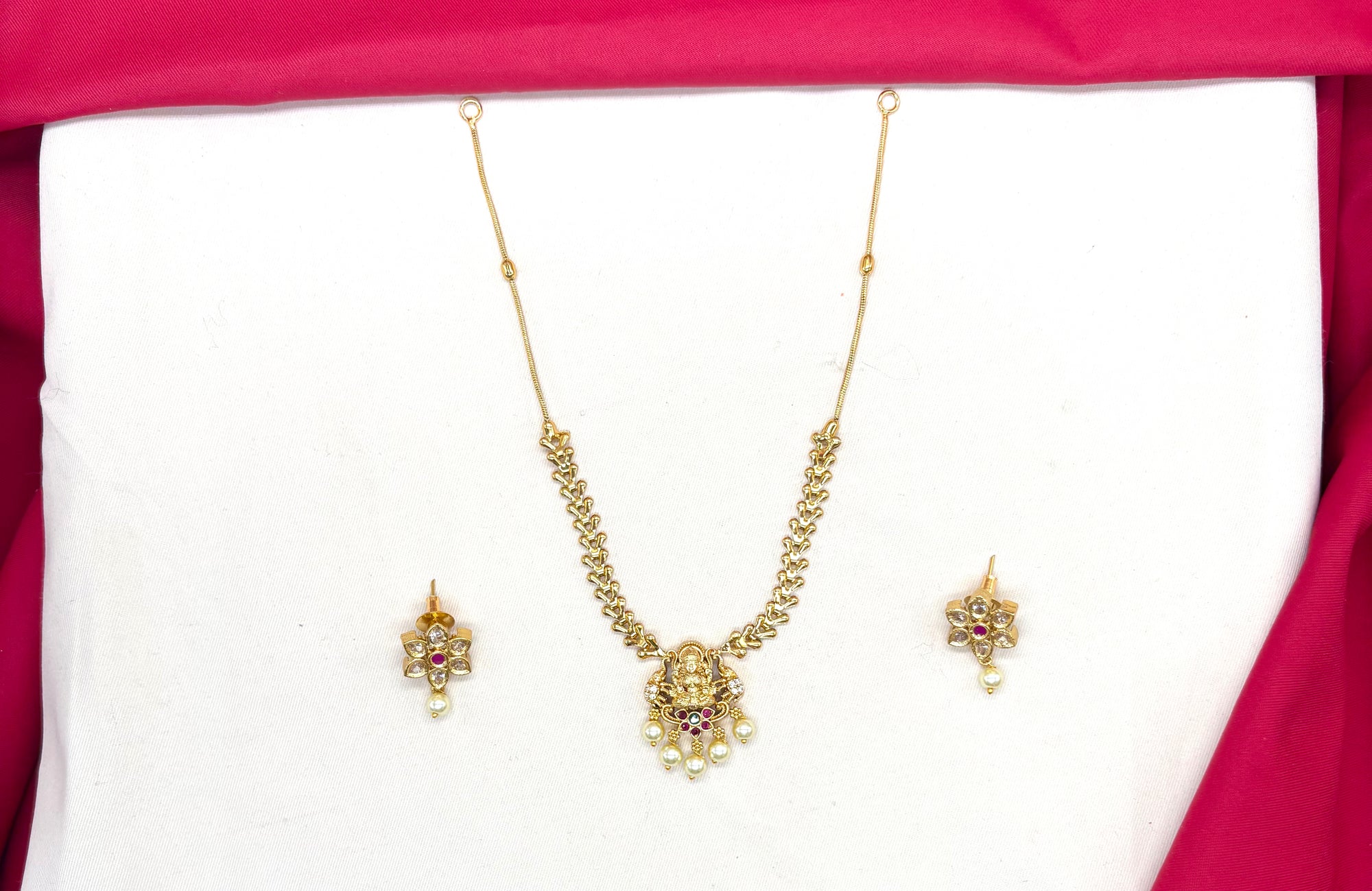 Matte finishing Lord Lakshmi pendant with floral chain Short Necklace