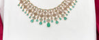 Premium matte finish American Diamonds flower design with Mint-Green Stones Short Necklace