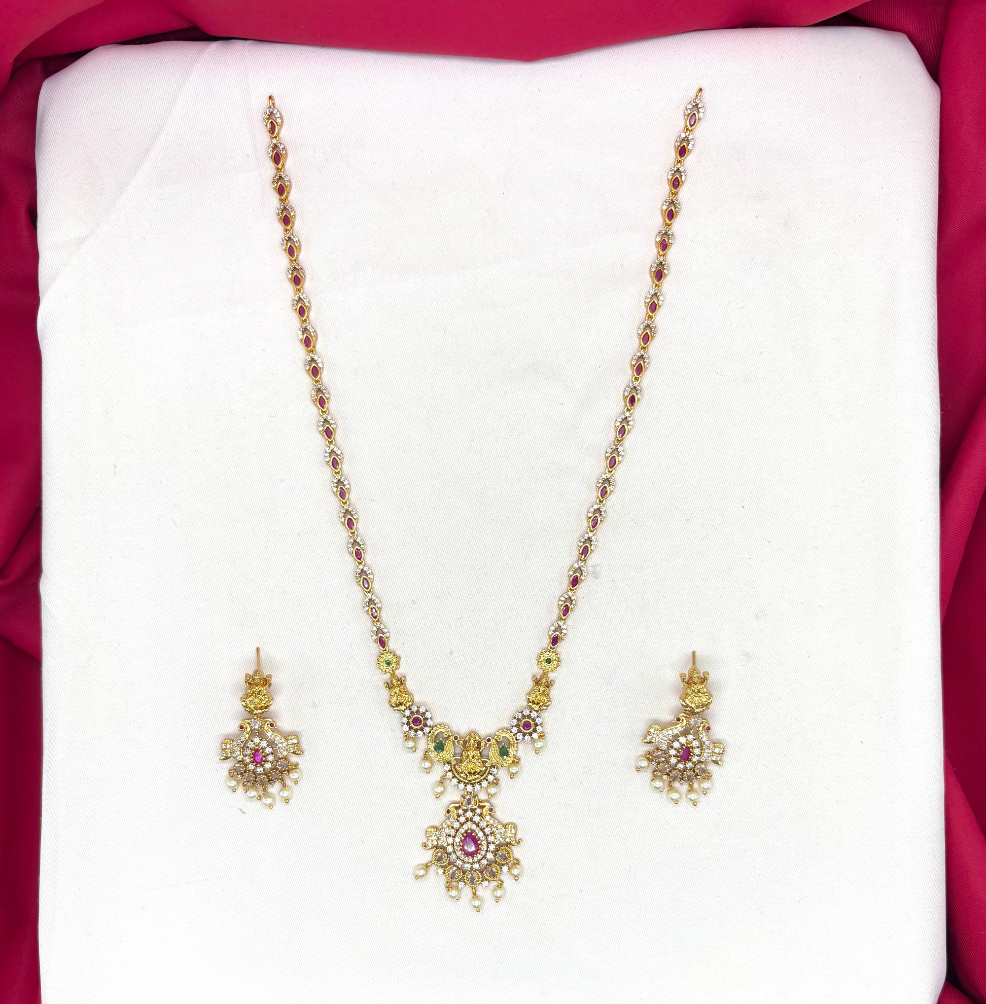 Matte finishing lord Lakshmi with pink stones and peacock finish Long haram