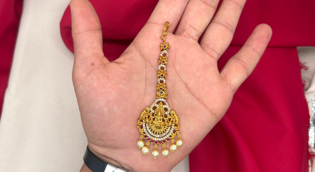 Matte finishing AD stones lord Lakshmi Maang tikka