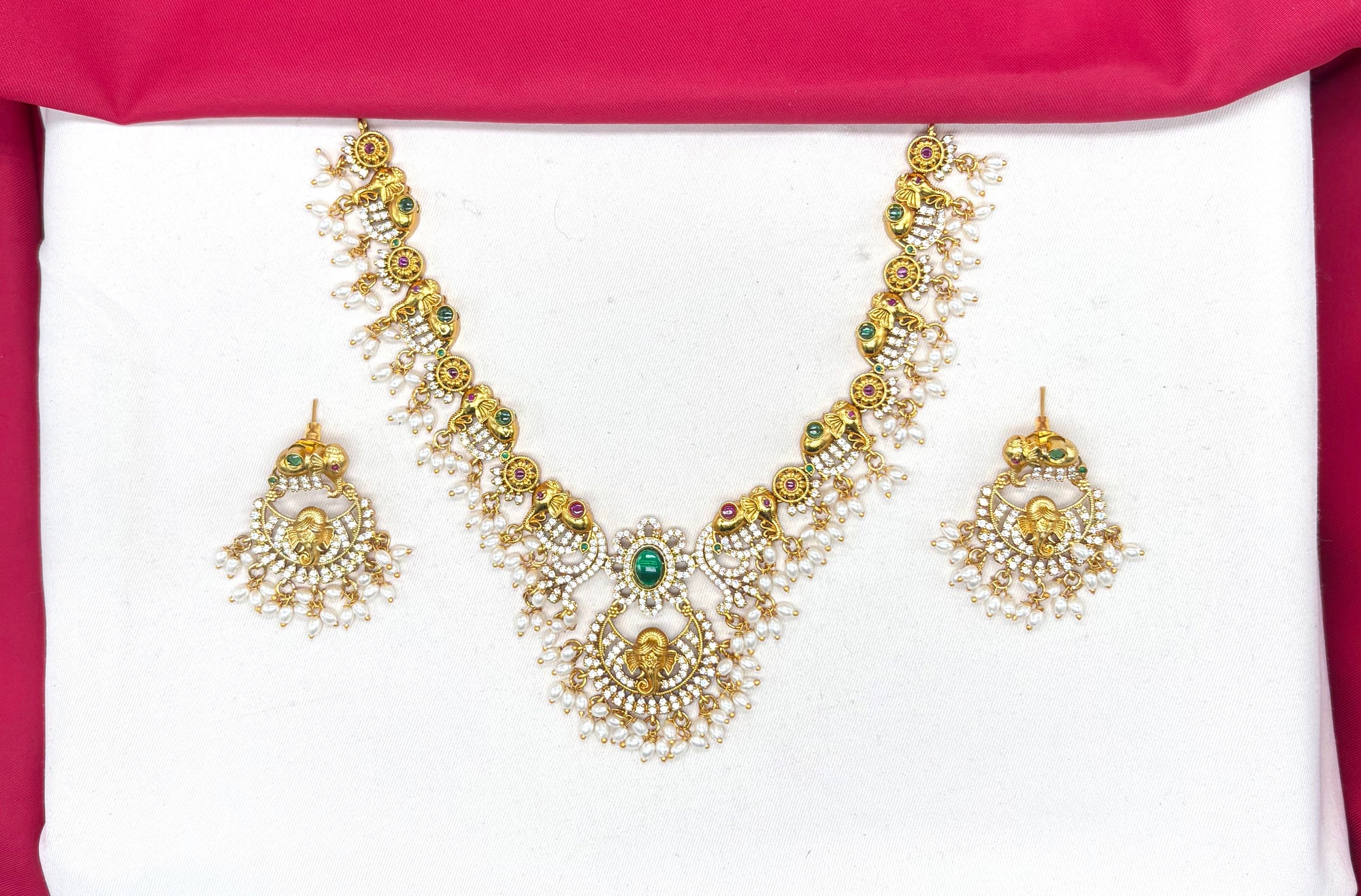 Gold finishing Lord Ganesha Pendant with Elephant design and Ad stones Short Necklace