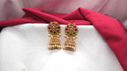 Matte finishing floral design with white pearls Jhumkas earring￼