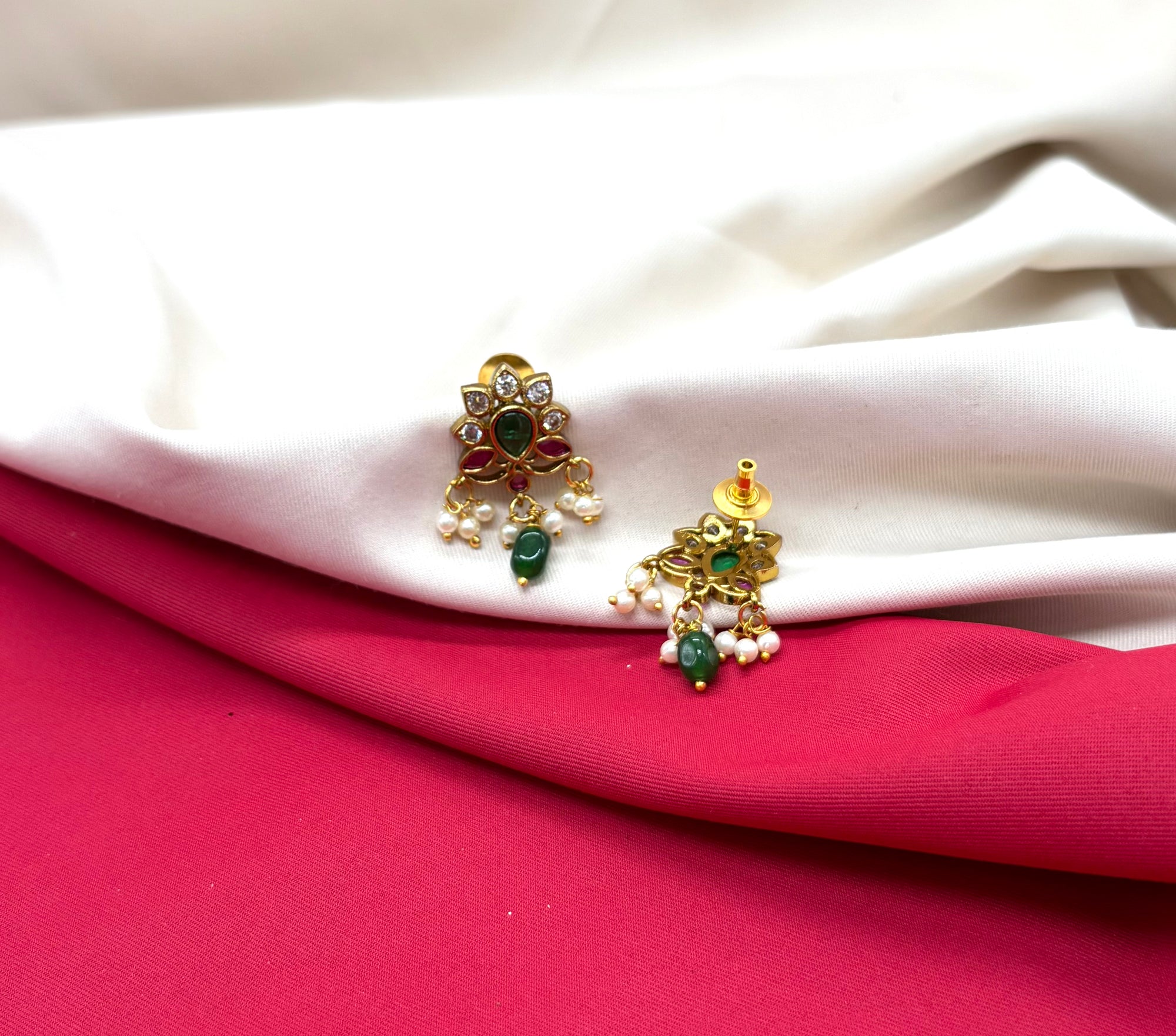 Kempu jadau Flower design dangling Green stone drop.