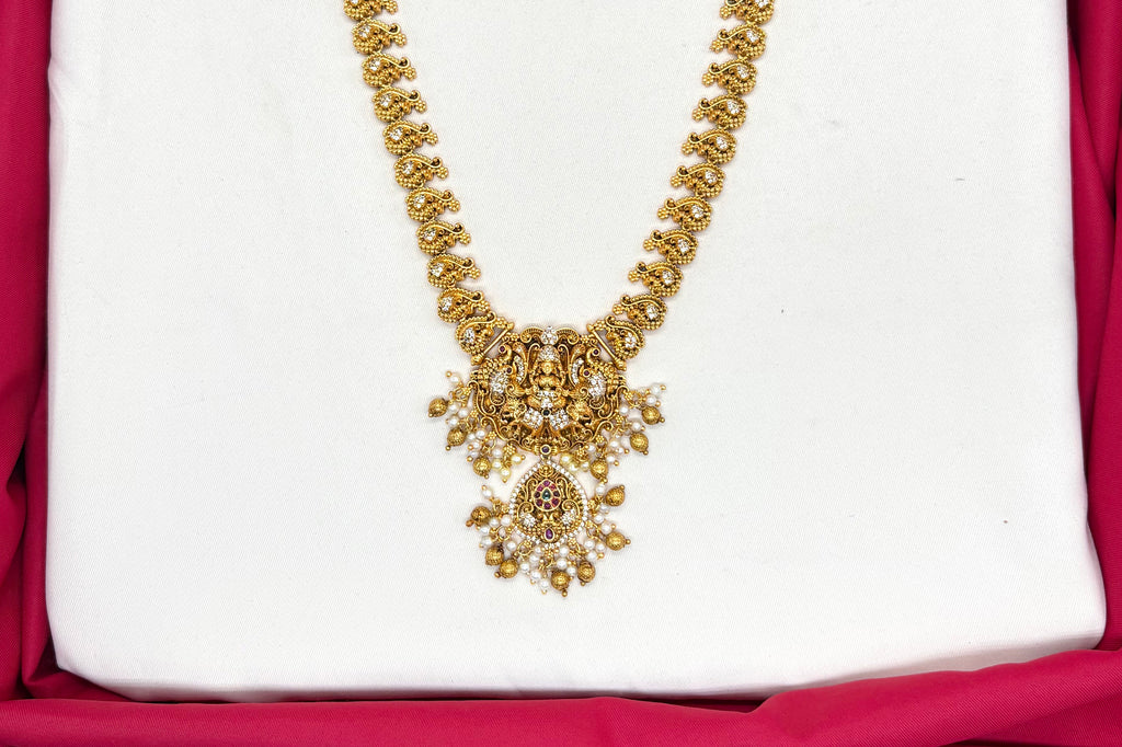 Premium matte finishing with lorded Lakshmi pendant ad stones long haram