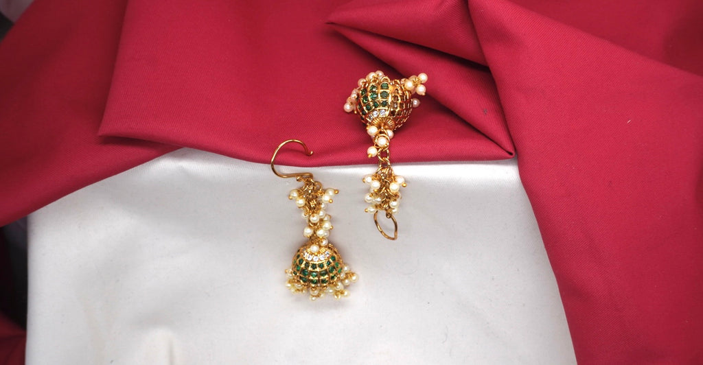 Matte finishing Green stones with cluster of pearls Jhumka earrings