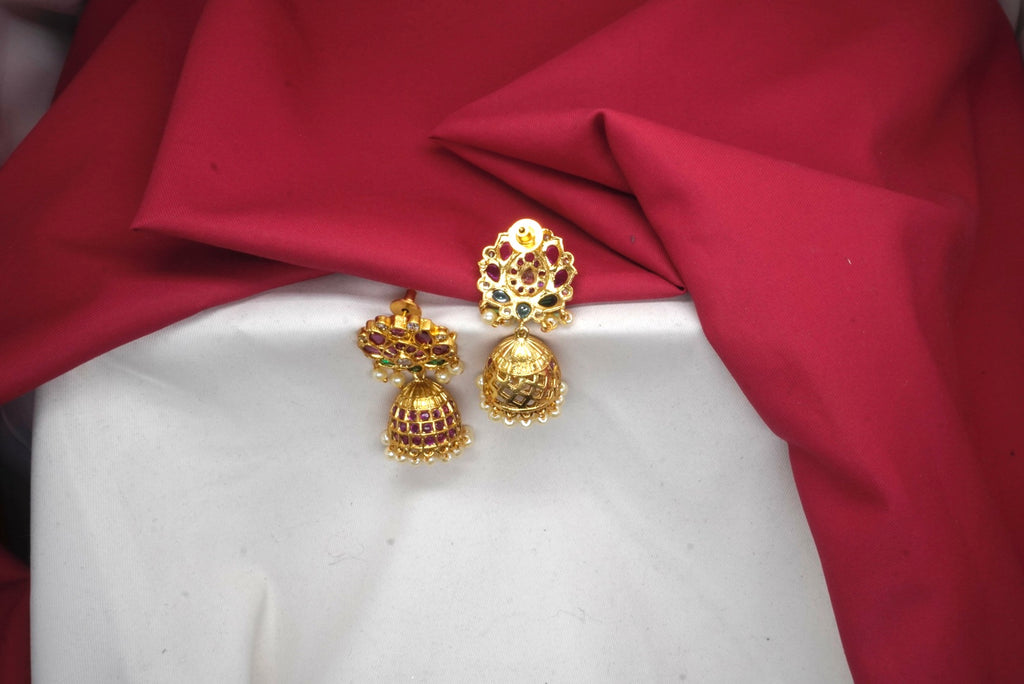 Matte finishing floral design with white pearls Jhumkas earring￼