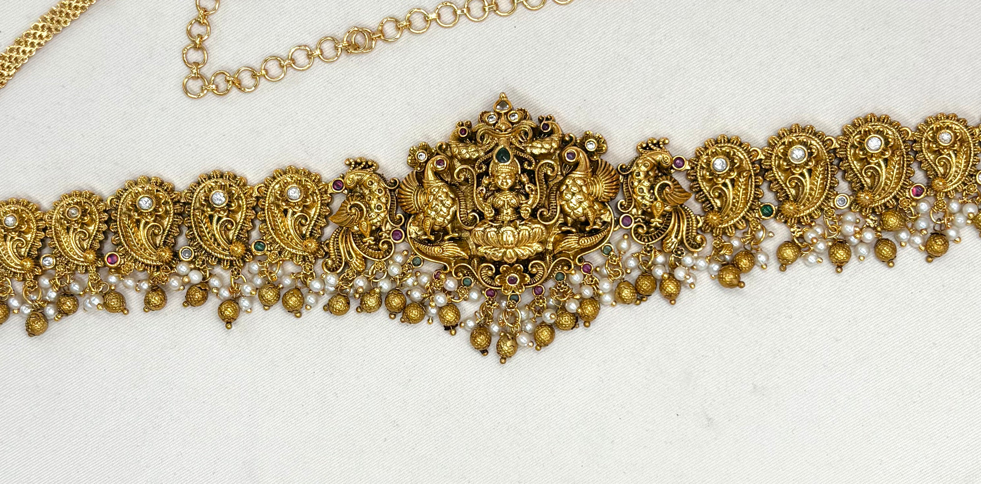 Matte finishing Lord Lakshmi peacock and pearls Chain Vaddanam