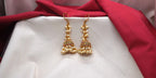 Matte finishing multi-stones with cluster of pearls Jhumka earrings