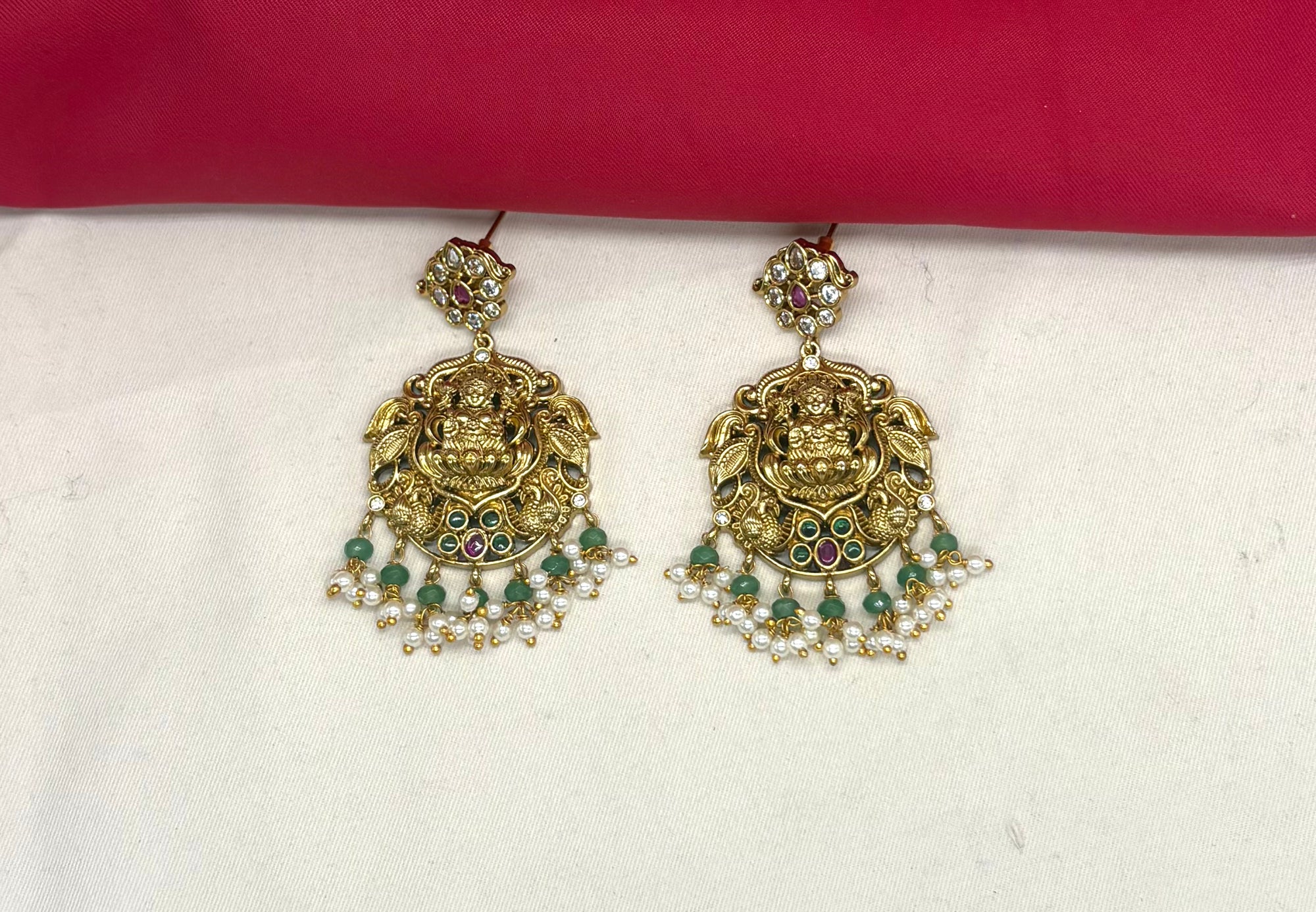 Jadau Kundan Beautifully designed with White pearls Lord Lakshmi pendant Short Necklace