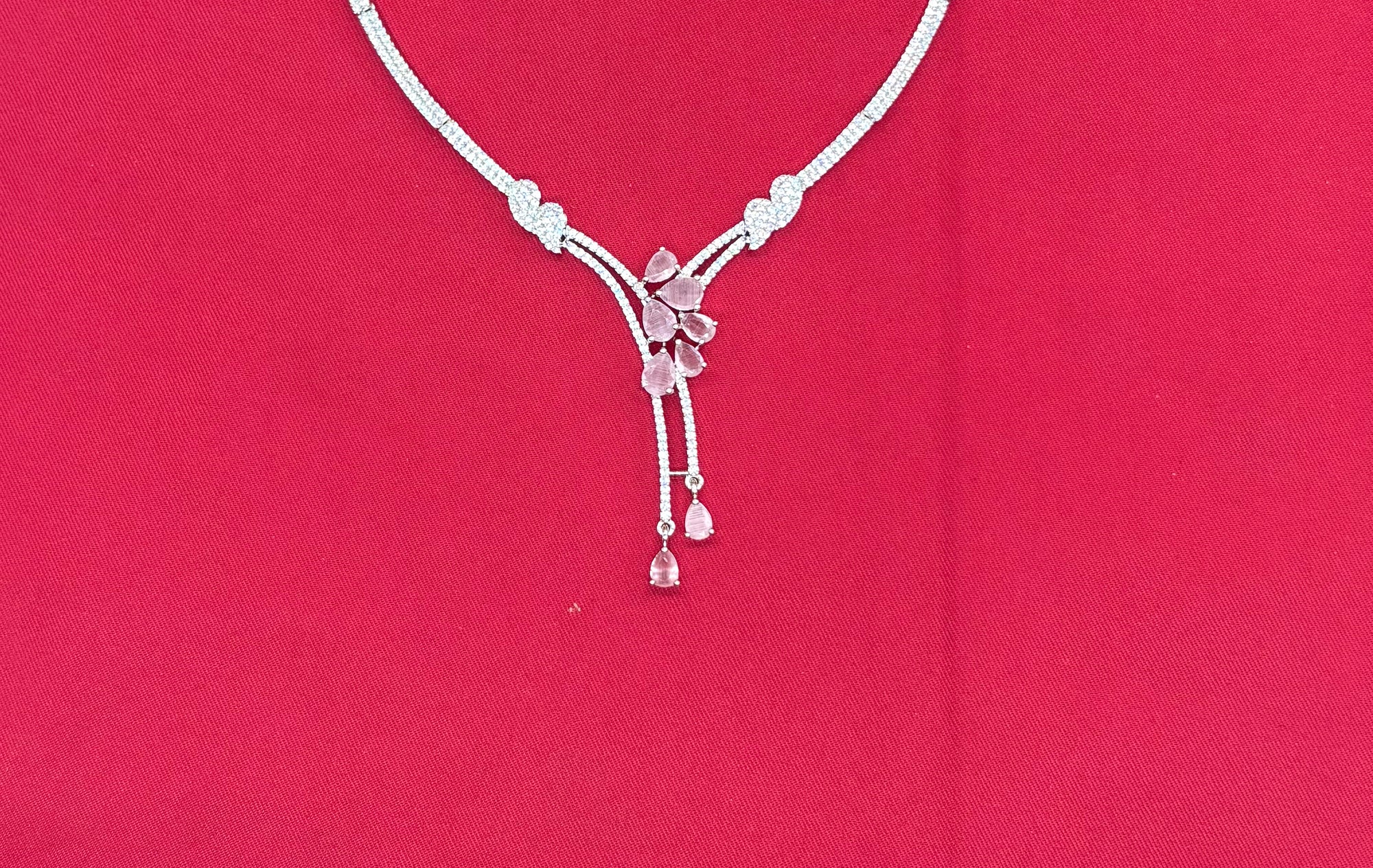 Silver American Diamonds stones deep Baby-pink teardrop and floral-shaped stones Short Necklace