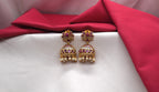 Matte finishing flower design pink & white stones with white pearls Jhumkas Earring