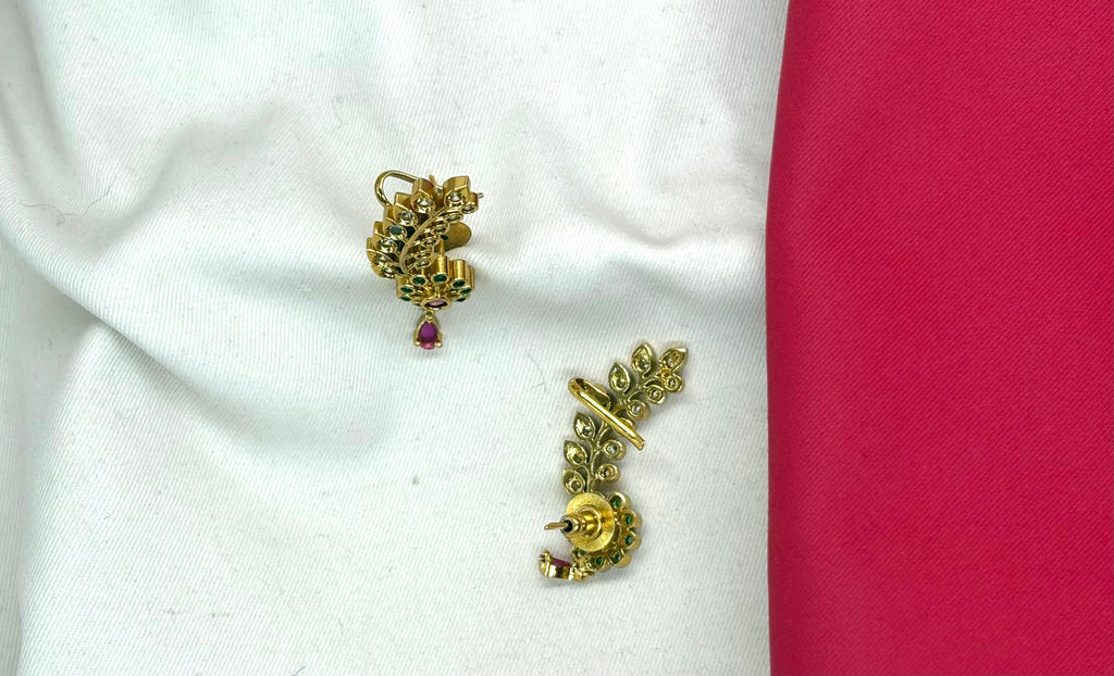 Matte finishing leaf design American diamonds with green stones earrings