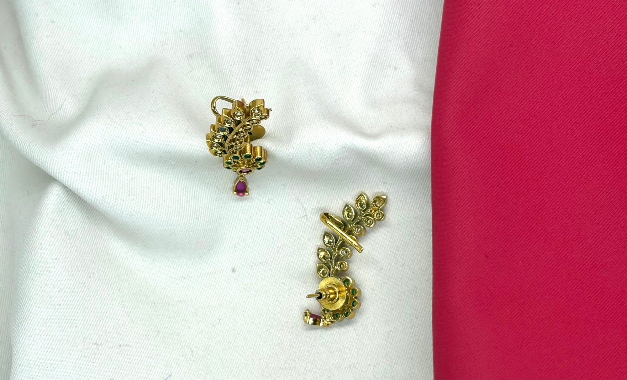 Matte finishing leaf design American diamonds with green stones earrings
