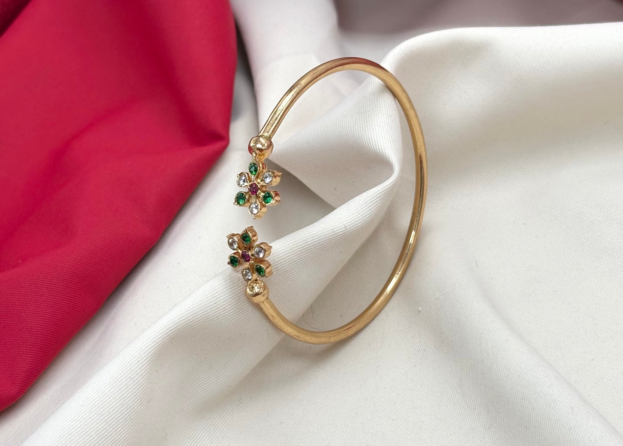 Adjustable Panchaloha kada floral design with white and Green stones