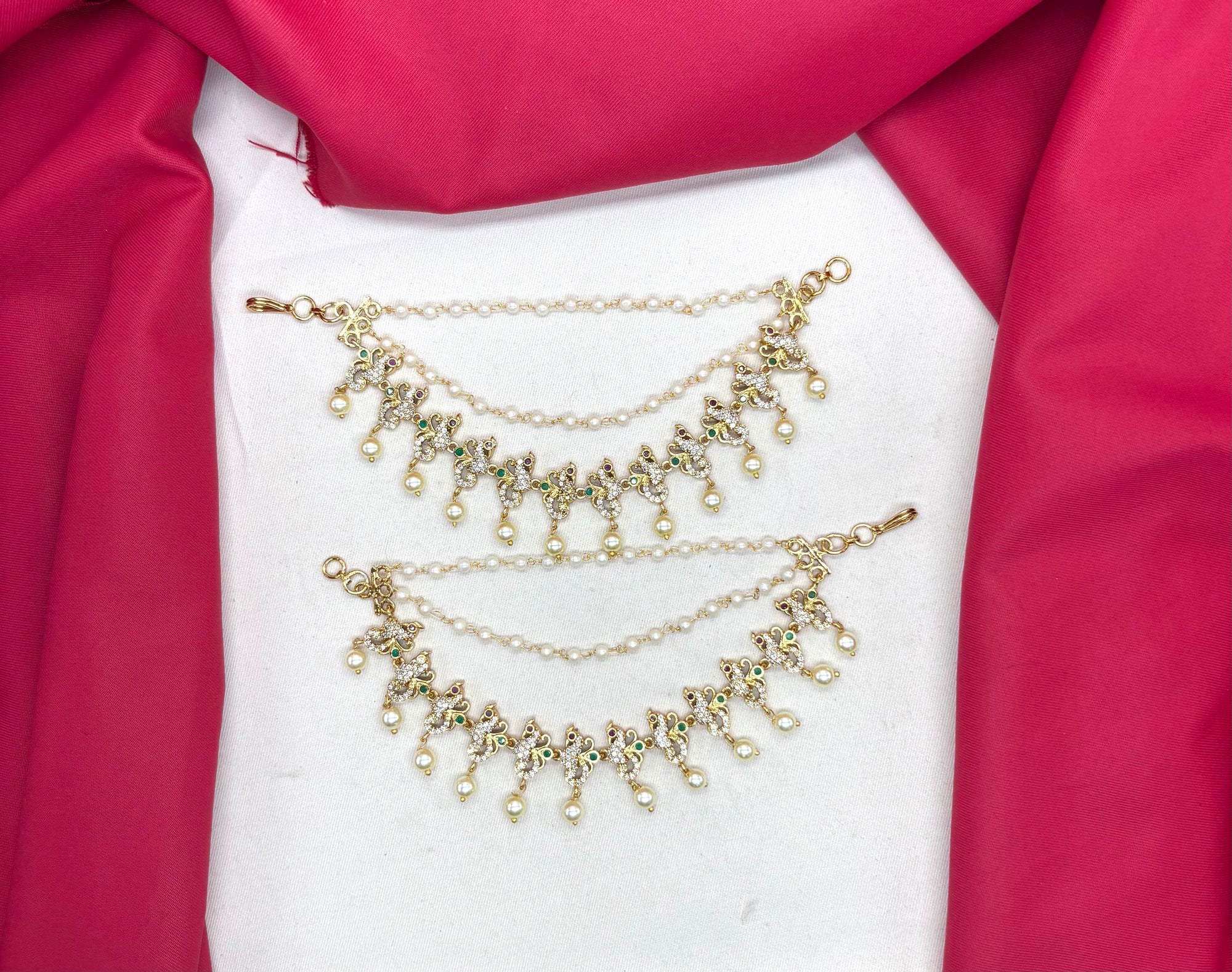 Matte finishing peacock design American Diamonds multi stones Champaswaralu