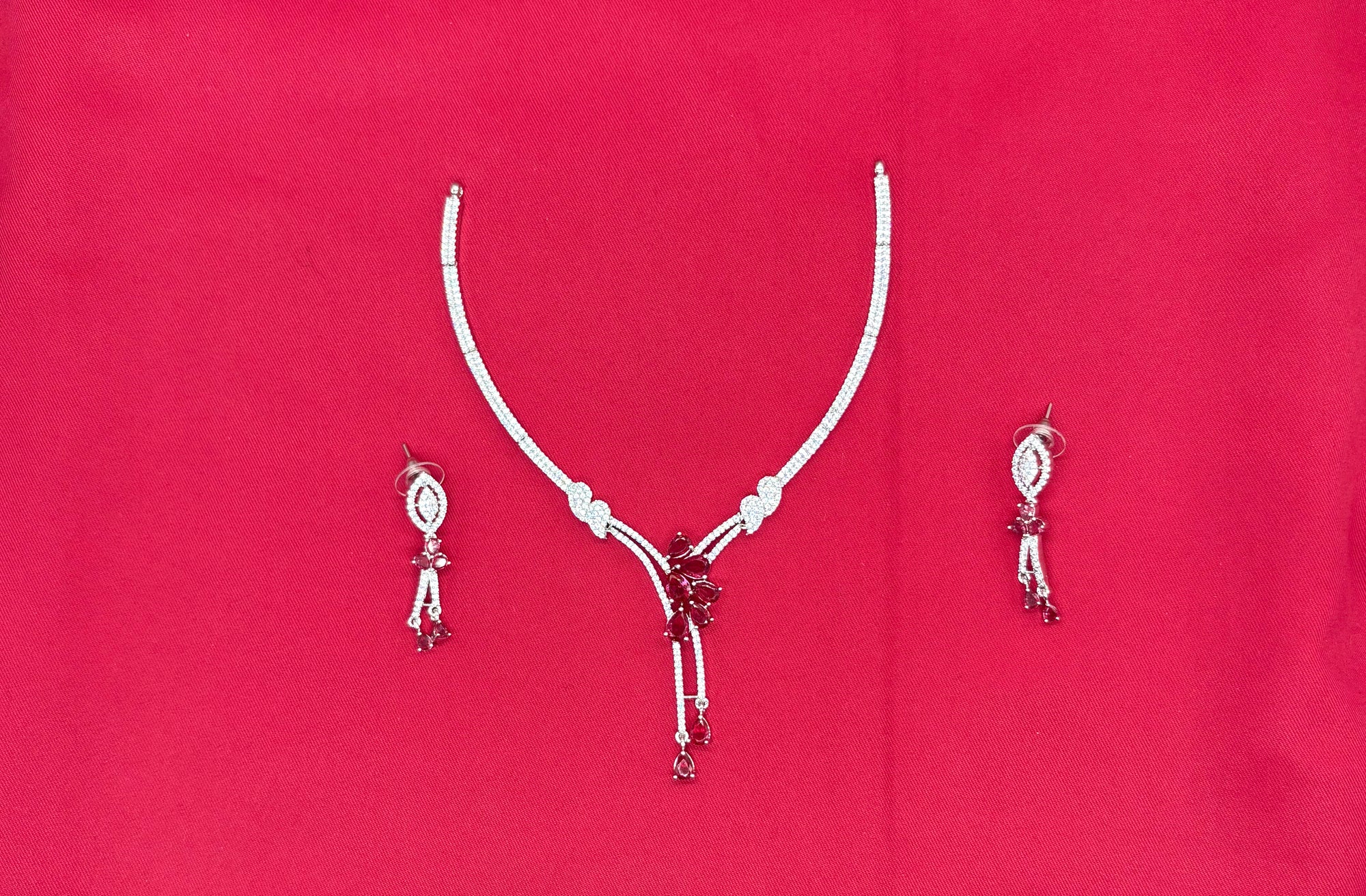 Silver American Diamonds stones deep ruby-red teardrop and floral-shaped stones Short Necklace