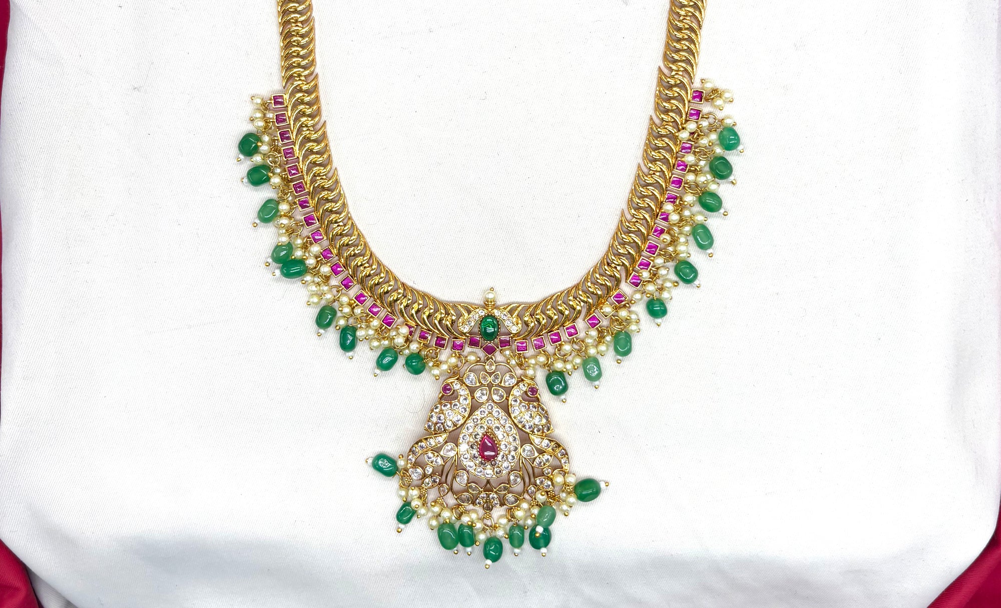 Matte finishing peacock design with Green beads Mango Long Haram