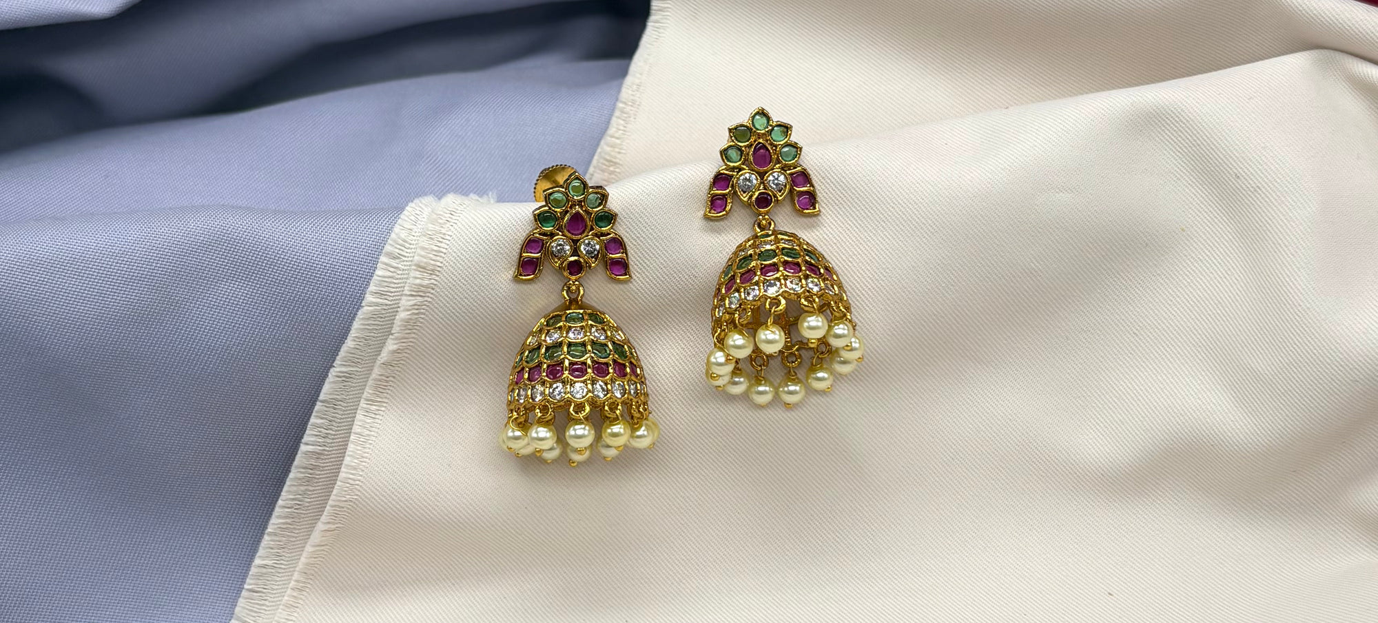 kempu jhumka white (American Diamond) stones, accented with delicate pearl drops Earrings