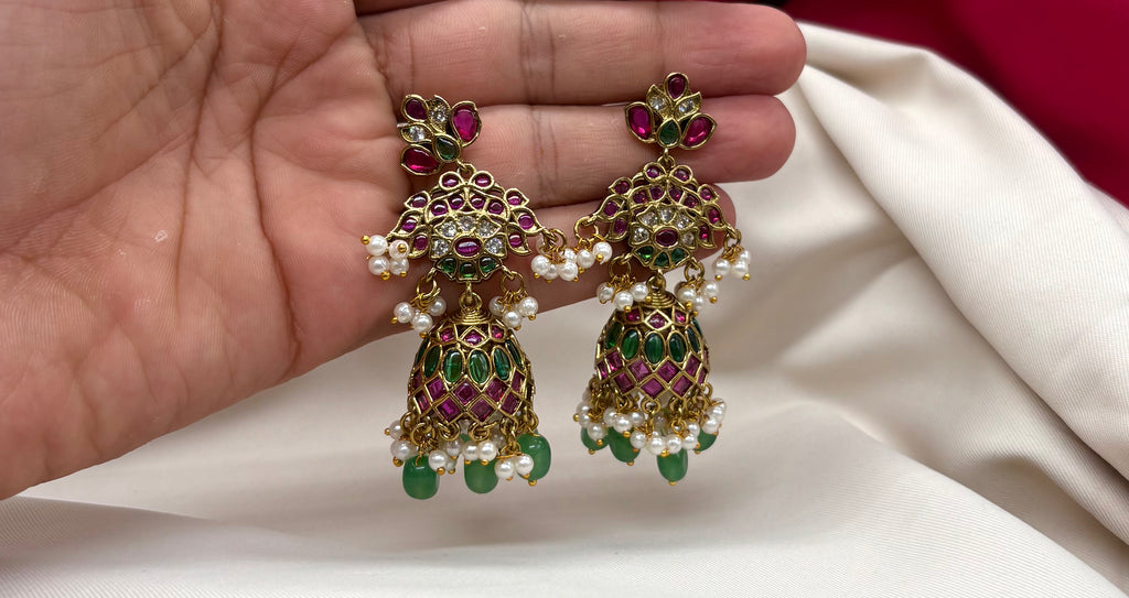 kempu stone jhumka with green beads and pearl hangings Earrings
