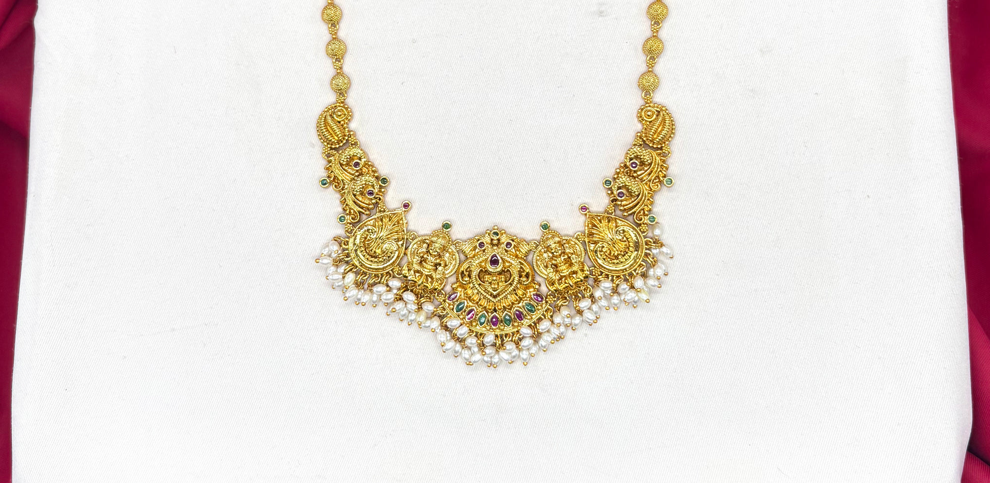 Matte finishing with lord Lakshmi with multi stones and white drop pearls short Necklace