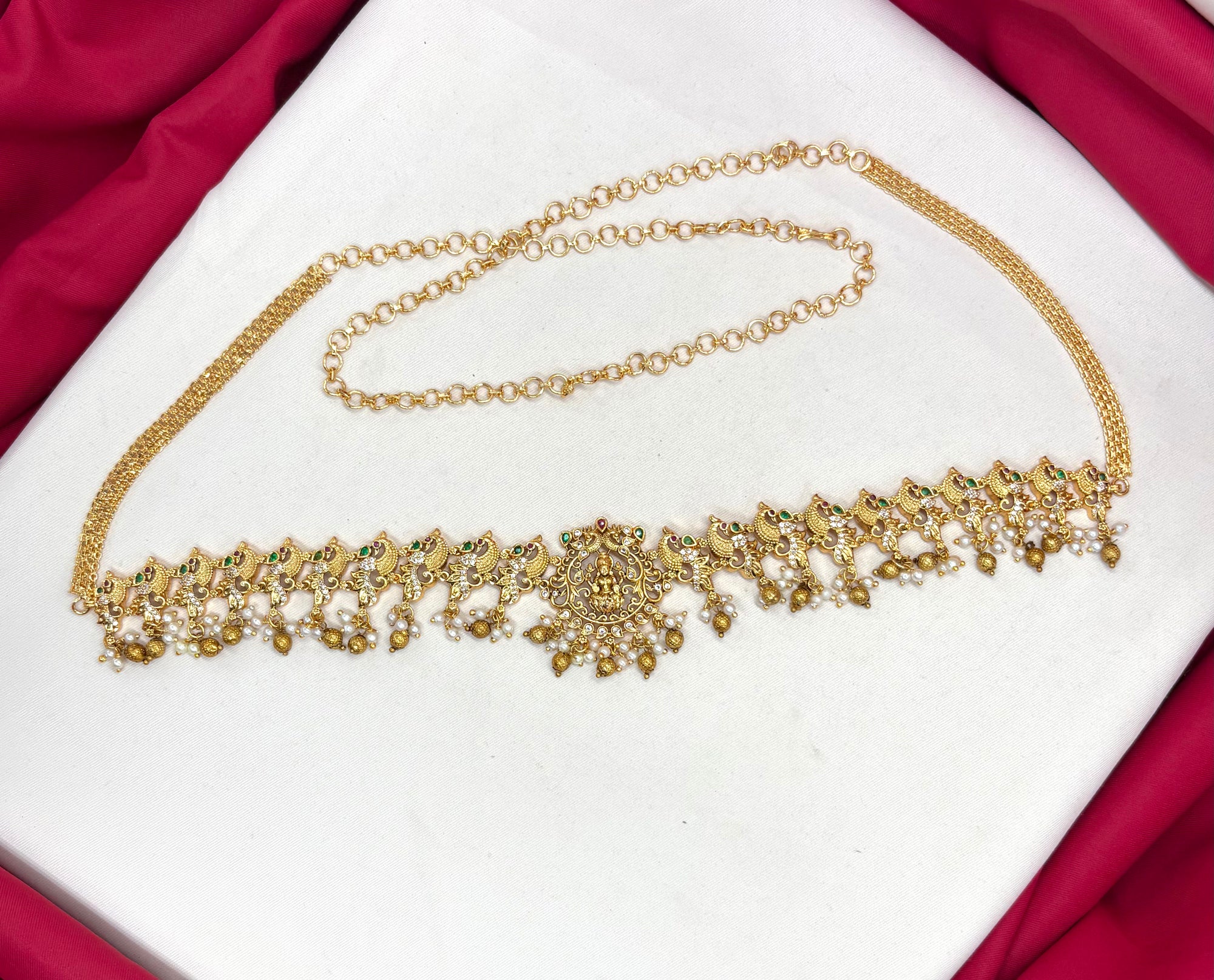 Matte finishing peacock design with golden balls chain vaddanam