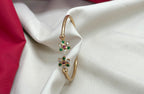 Adjustable Panchaloha kada floral design with white and Green stones