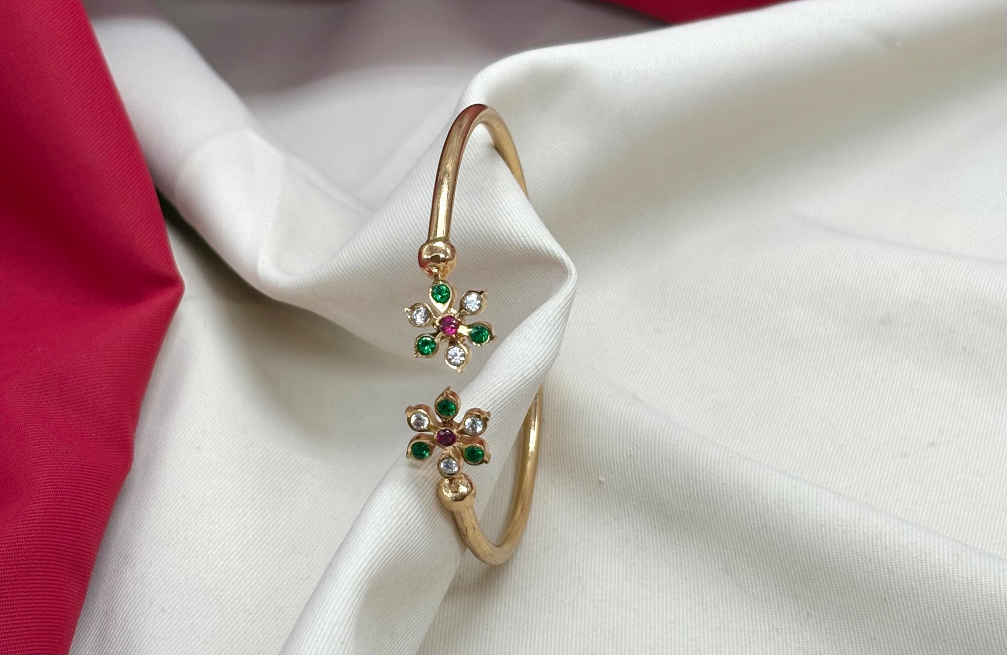 Adjustable Panchaloha kada floral design with white and Green stones