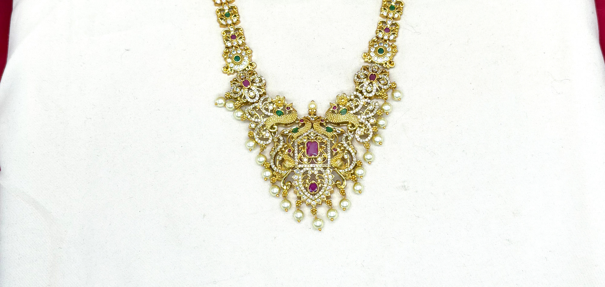 Matte finishing peacock and floral design with white pearls short Necklace