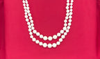 white double-layered pearl mala with a silver adjustable drawstring closure