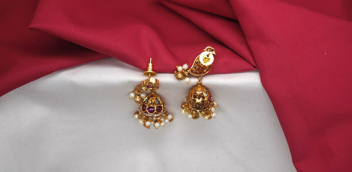 Matte finish American Diamond stones and pearls Bird design Jhumka Earrings