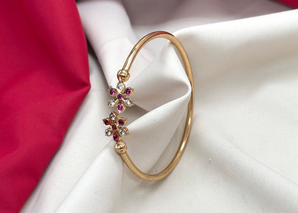 Adjustable Panchaloha kada floral design with white and ruby stones