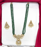 Elegant Green beads paired with a traditional, gold-finished pendant Necklace