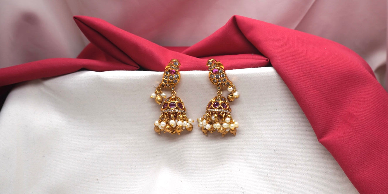 Matte finish American Diamond stones and pearls Bird design Jhumka Earrings