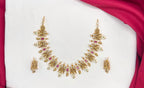 22K gold-plated handcrafted artificial temple featuring divine Lakshmi motifs, cubic zirconia stones,Short Necklace