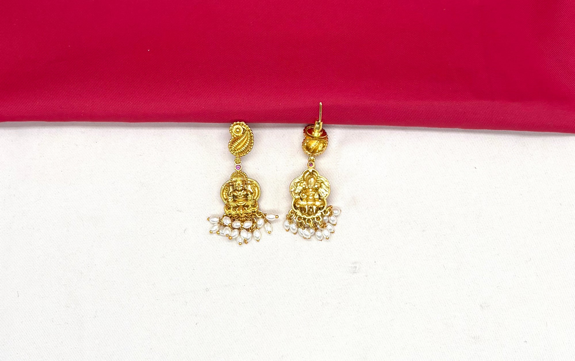 Matte finishing with lord Lakshmi with multi stones and white drop pearls short Necklace