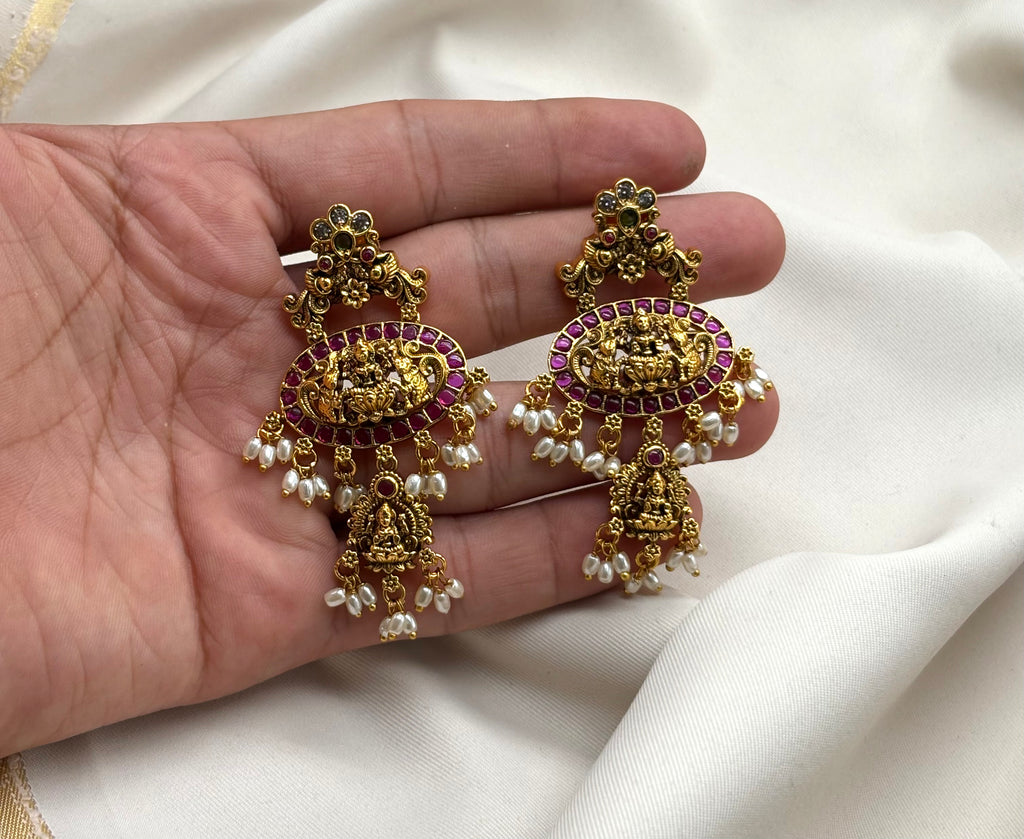 Nakshi finishing Kempu stones with lord Lakshmi rice pearl’s Earring