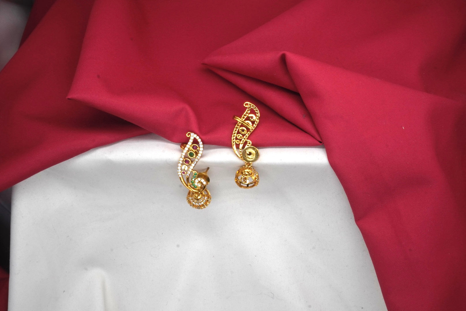Matte finishing peacock-themed cubic zirconia stone Jhumka Earring
