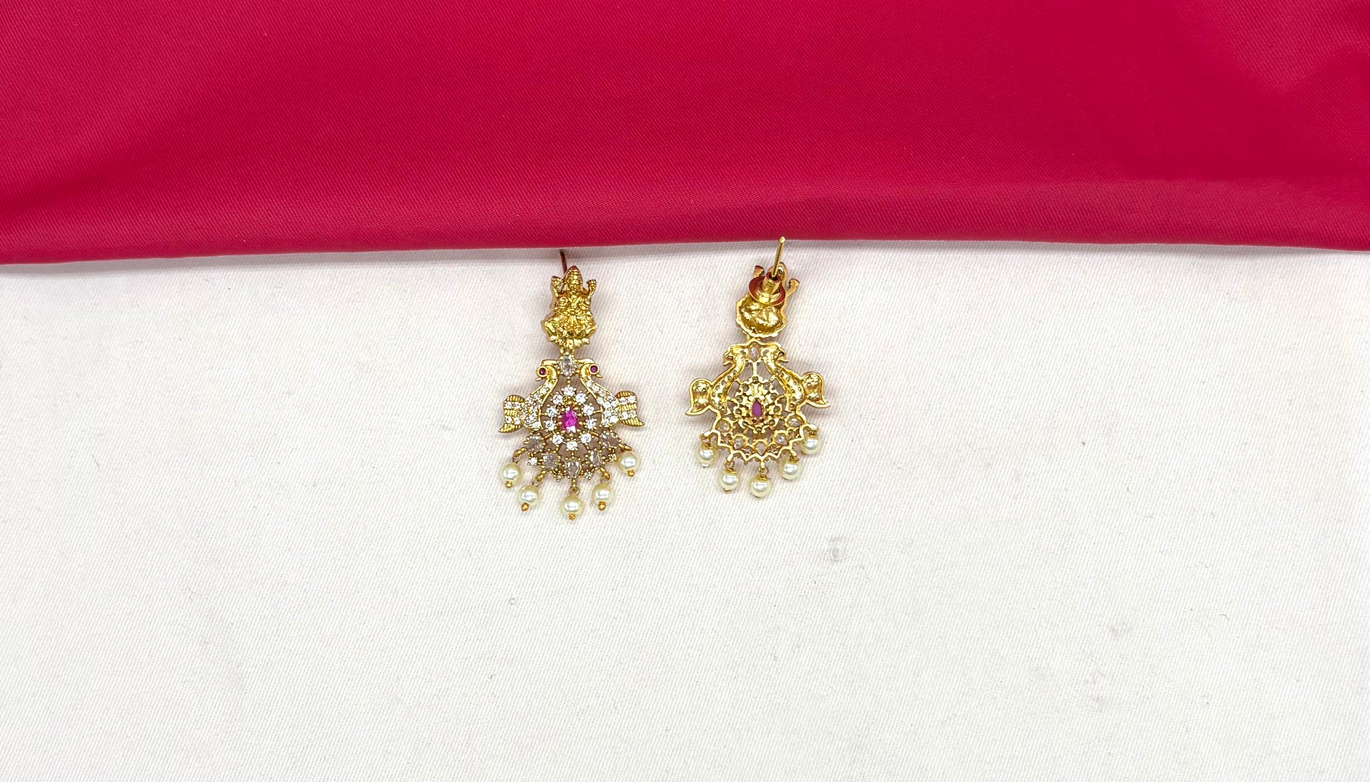 Matte finishing lord Lakshmi with pink stones and peacock finish Long haram