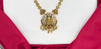 Matte finishing Goddess Lakshmi pendant, green stones, and pearl drops Short Necklace