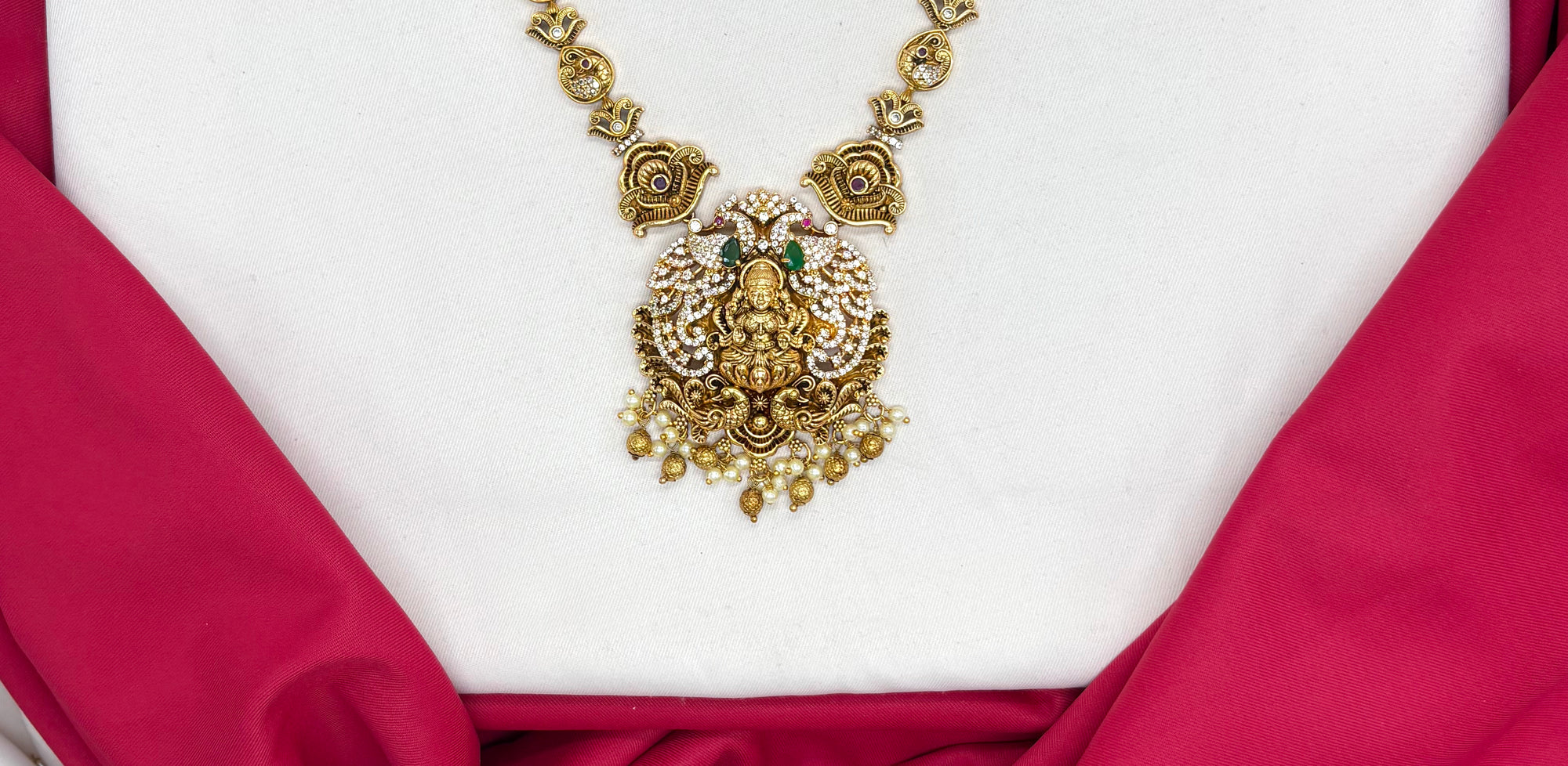 Matte finishing Goddess Lakshmi pendant, green stones, and pearl drops Short Necklace