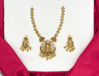 Matte finishing Goddess Lakshmi pendant, green stones, and pearl drops Short Necklace