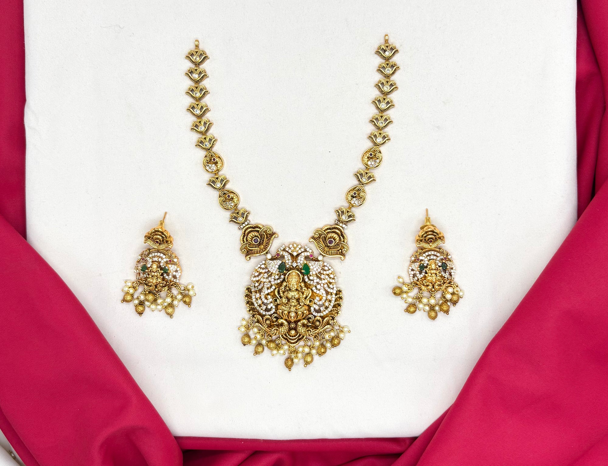 Matte finishing Goddess Lakshmi pendant, green stones, and pearl drops Short Necklace