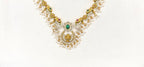 Gold finishing Lord Ganesha Pendant with Elephant design and Ad stones Short Necklace