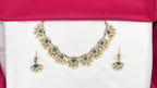 Matte finishing American Diamonds with Green stones and Guttapusalu Short Necklace